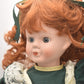 Vintage Porcelain Doll Ginger Hair, Green Eyes and Green Christmas Dress