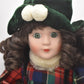 Vintage Porcelain Doll Brown Hair, Green Eyes and Tartan Dress