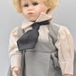 Vintage Porcelain Doll – Blonde Hair, Blue Eyes & Pinafore Dress