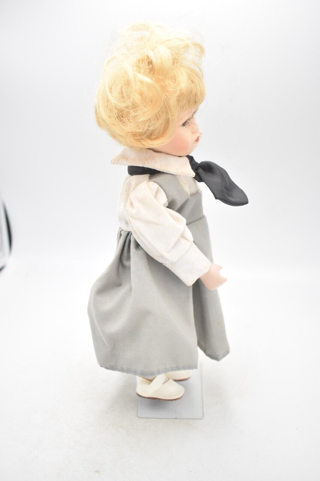 Vintage Porcelain Doll – Blonde Hair, Blue Eyes & Pinafore Dress