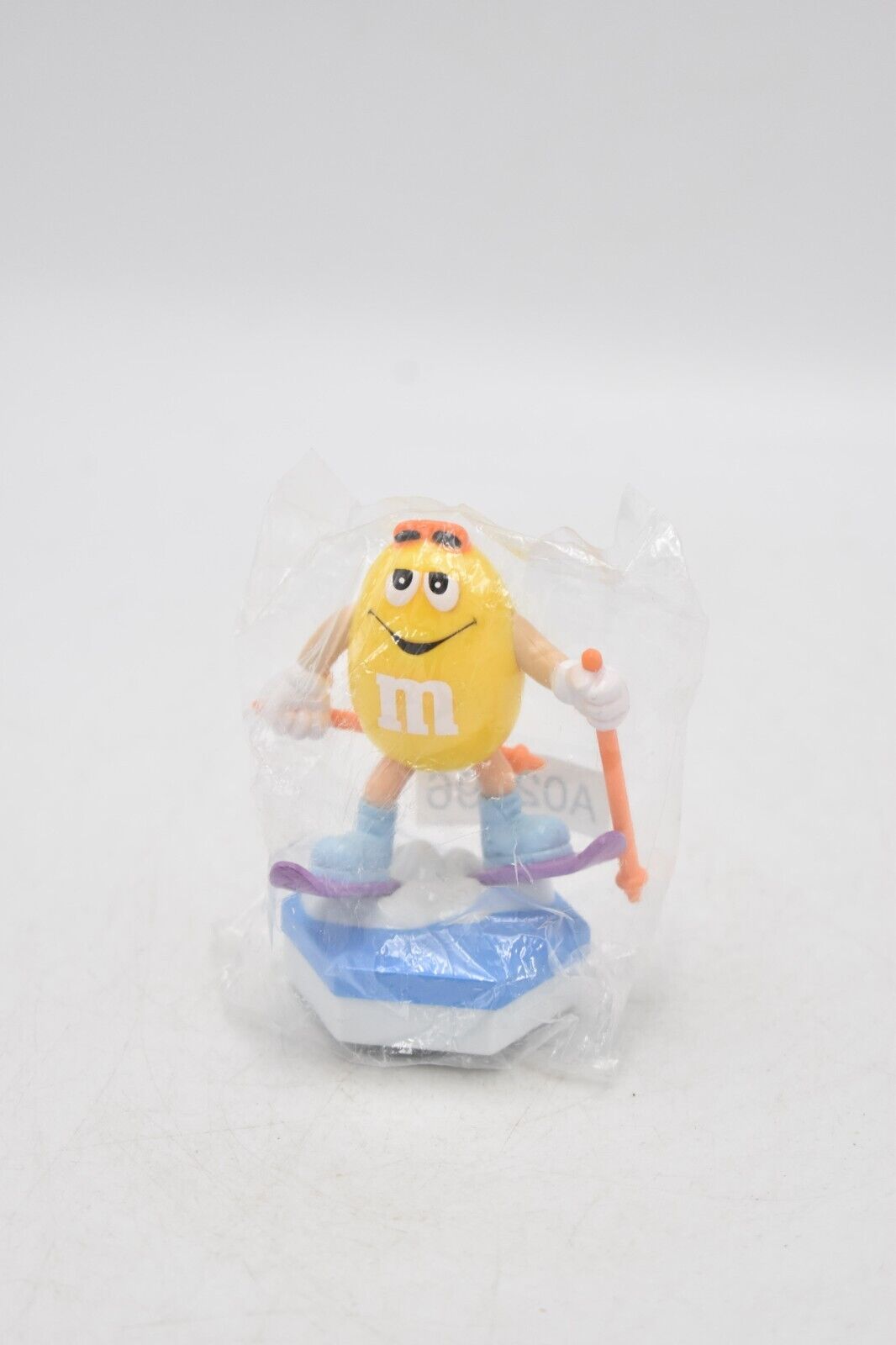 M&M's Yellow Peanut Character Skier Cake Topper Sealed