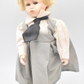 Vintage Porcelain Doll – Blonde Hair, Blue Eyes & Pinafore Dress