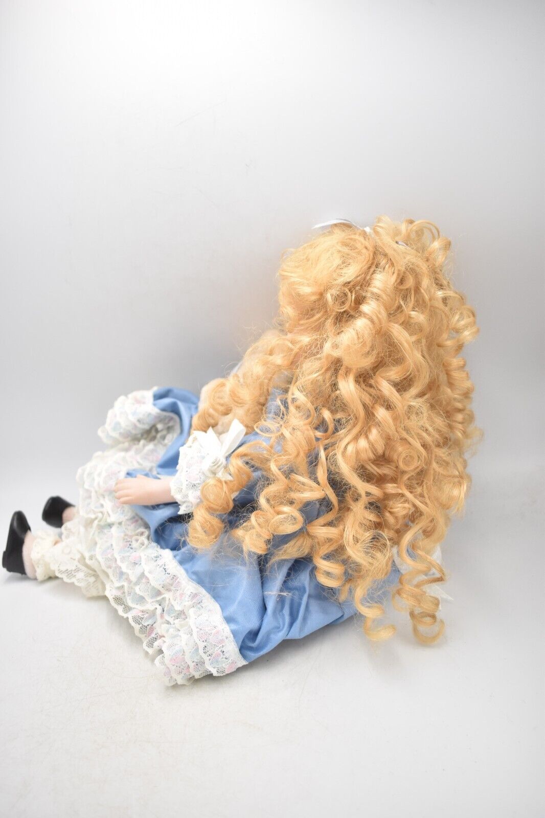 Vintage Porcelain Doll With Teddy Bear Blonde Hair, Blue Eyes and Blue Silk Dres