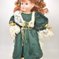 Vintage Porcelain Doll Ginger Hair, Green Eyes and Green Christmas Dress