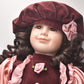 Vintage Porcelain Doll Brown Hair, Brown Eyes and Pink Silk Dress