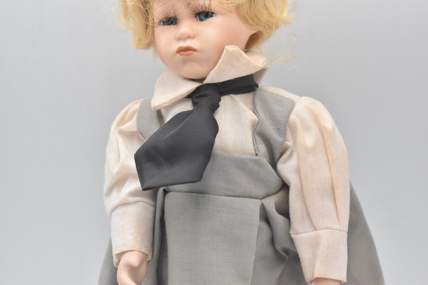 Vintage Porcelain Doll – Blonde Hair, Blue Eyes & Pinafore Dress