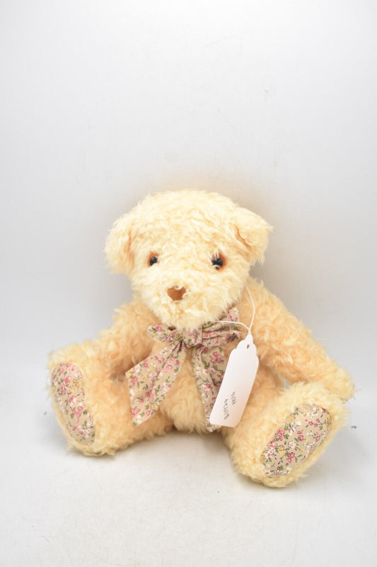 Vintage Plush Teddy Bear with Matching Paws and Bow Retired