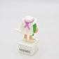 M&M's Ms Green Character Holding Flowers Cake Topper