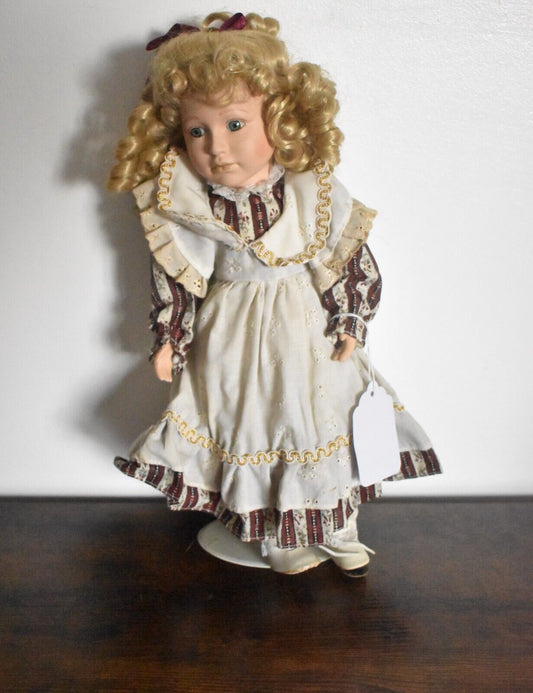 Vintage Porcelain Doll Blonde Hair, Green Eyes and Pinafore Dress