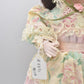 Vintage Porcelain Doll Brown Hair, Brown Eyes and Floral Dress