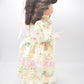 Vintage Porcelain Doll Brown Hair, Brown Eyes and Floral Dress