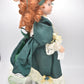 Vintage Porcelain Doll Ginger Hair, Green Eyes and Green Christmas Dress