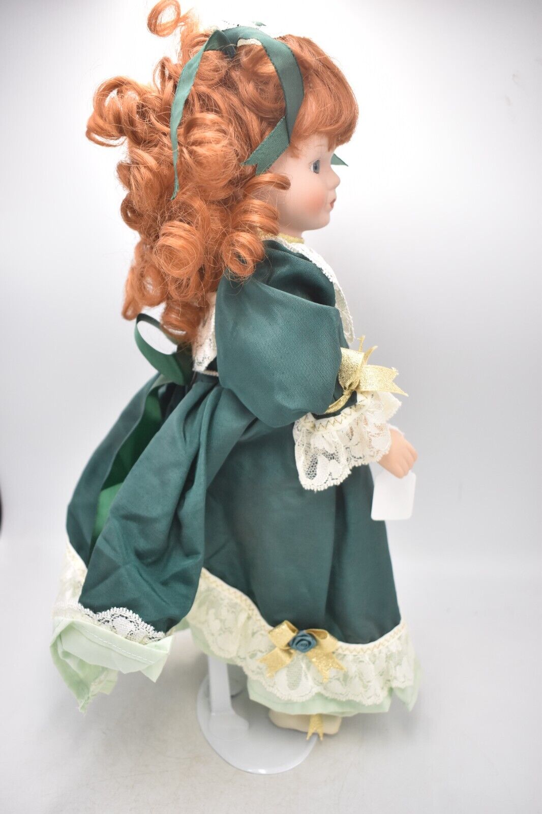 Vintage Porcelain Doll Ginger Hair, Green Eyes and Green Christmas Dress