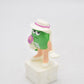 M&M's Ms Green Character Holding Flowers Cake Topper