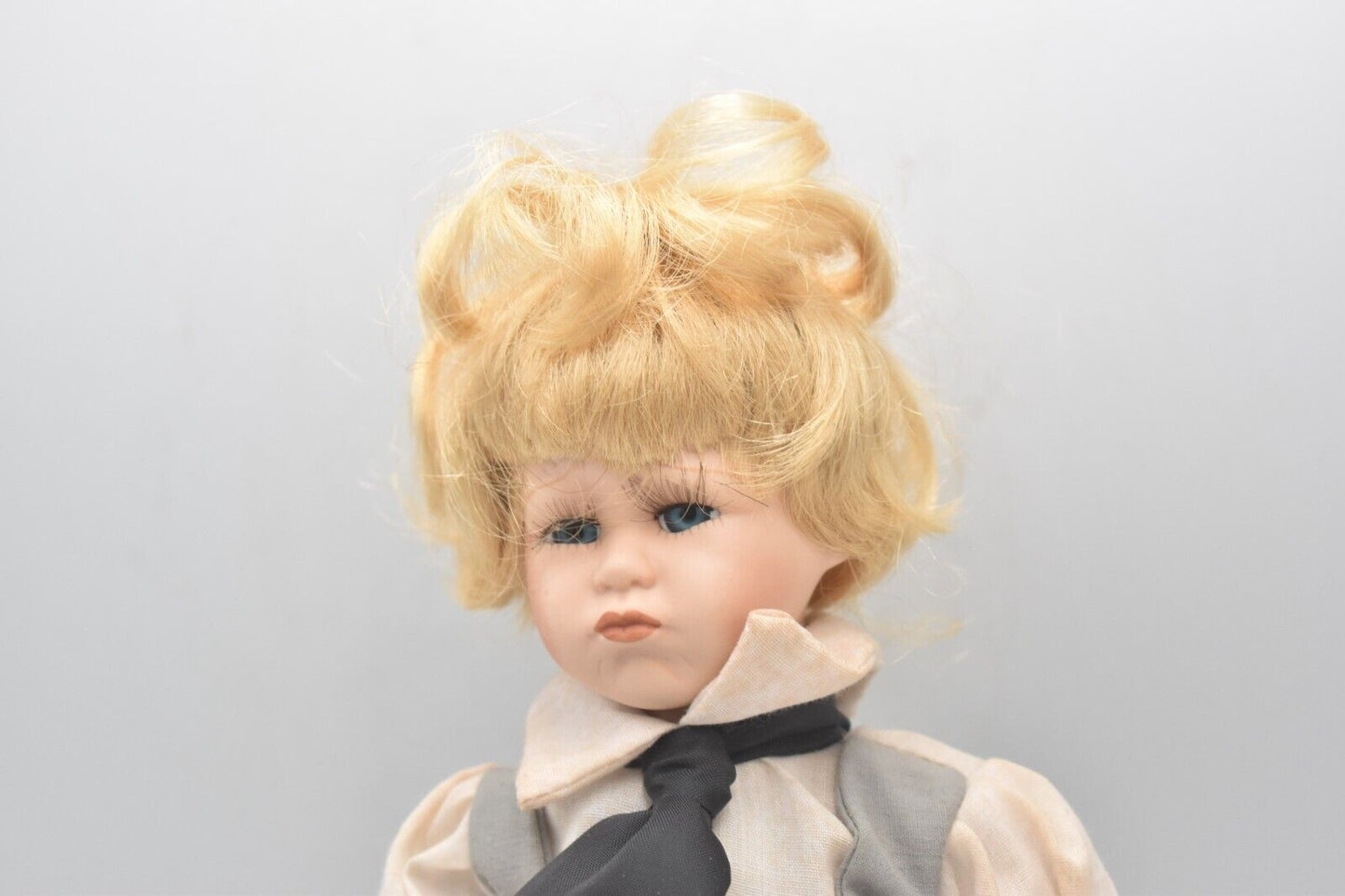 Vintage Porcelain Doll – Blonde Hair, Blue Eyes & Pinafore Dress