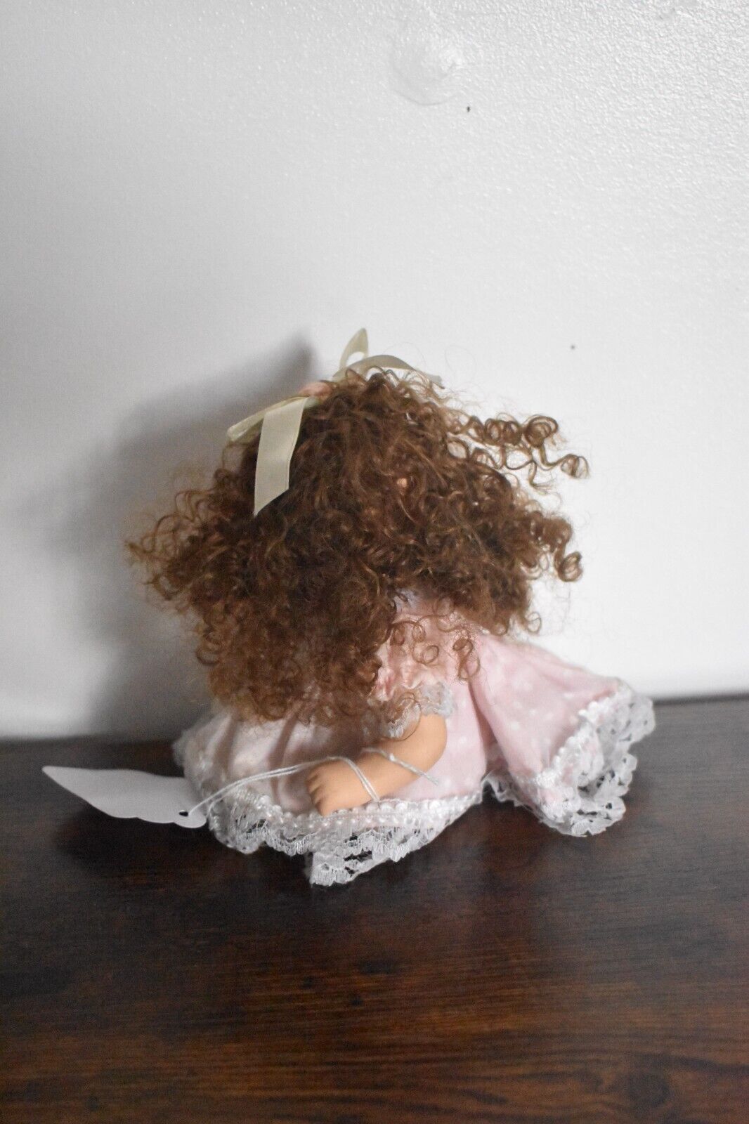 Vintage Bisque Doll Brown Curly Hair, Blue Eyes and Pink Dress