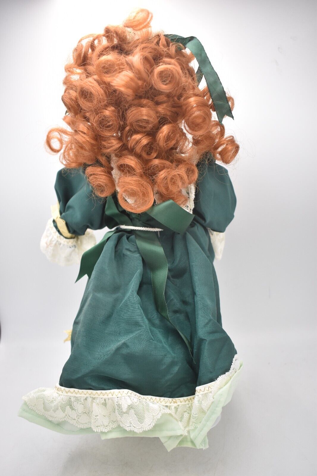 Vintage Porcelain Doll Ginger Hair, Green Eyes and Green Christmas Dress