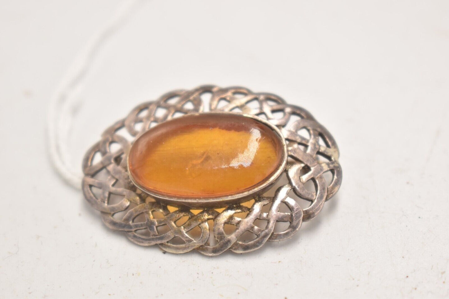 Vintage Oval Baltic Amber Brooch in Silver Coloured Setting