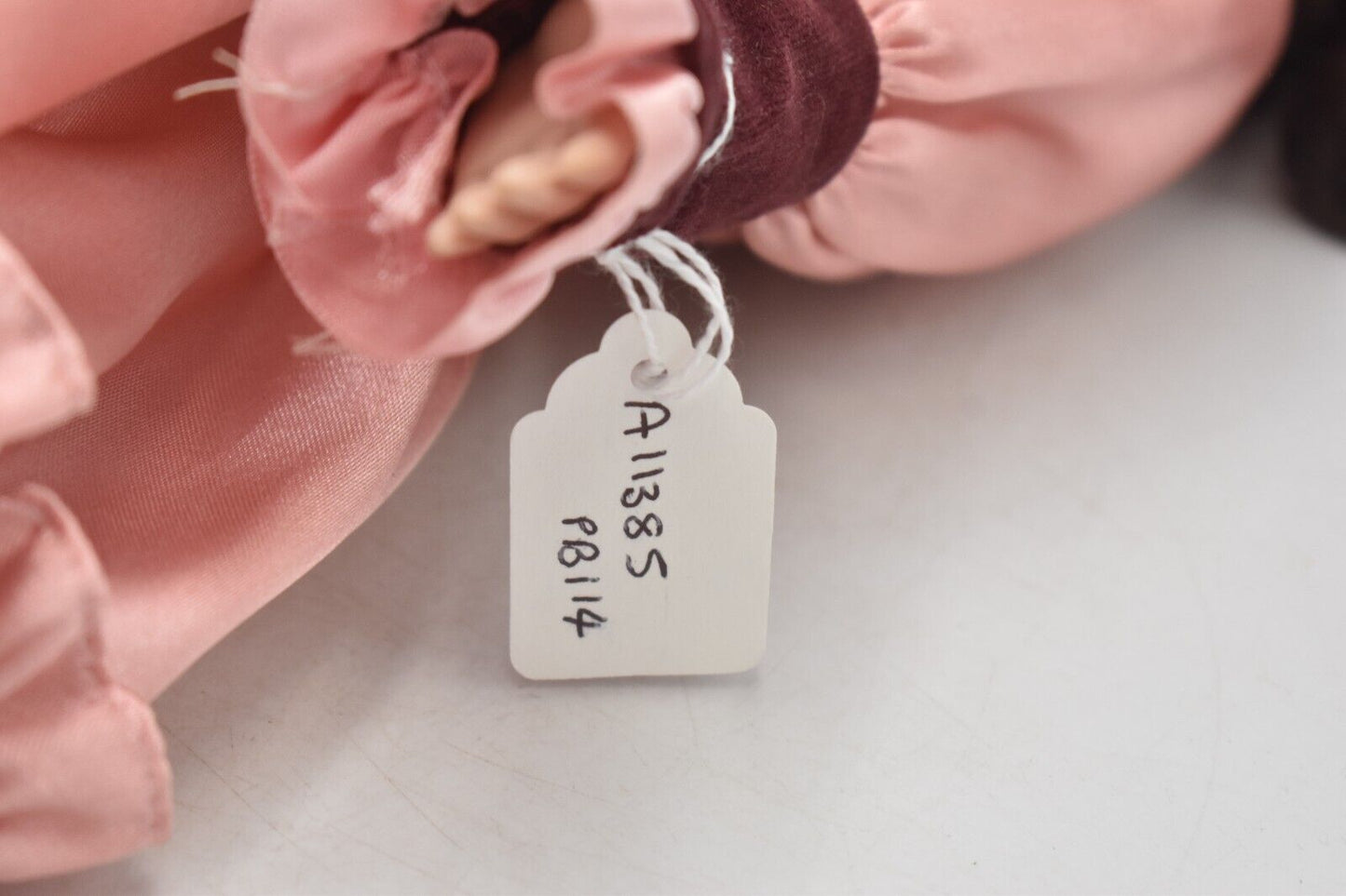 Vintage Porcelain Doll Brown Hair, Brown Eyes and Pink Silk Dress