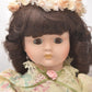 Vintage Porcelain Doll Brown Hair, Brown Eyes and Floral Dress