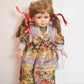 Vintage Porcelain Doll Hula Hooping Blonde Hair, Blue Eyes and Floral Dress