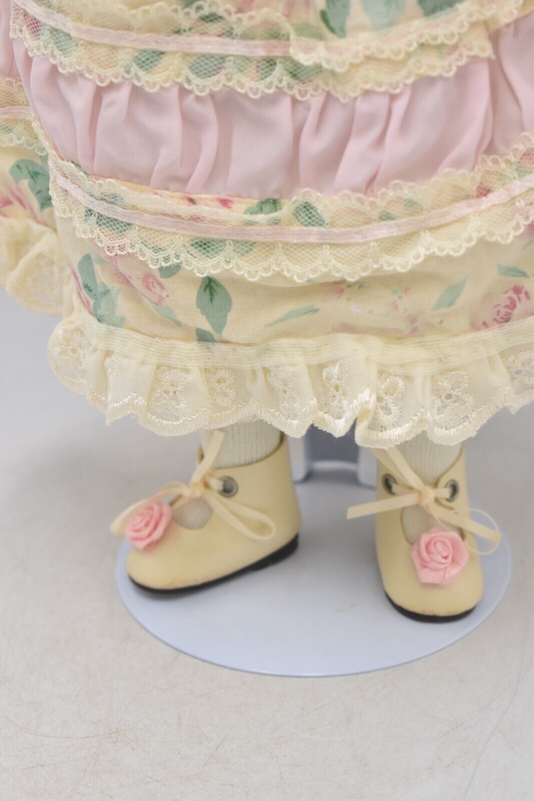 Vintage Porcelain Doll Brown Hair, Brown Eyes and Floral Dress