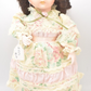 Vintage Porcelain Doll Brown Hair, Brown Eyes and Floral Dress