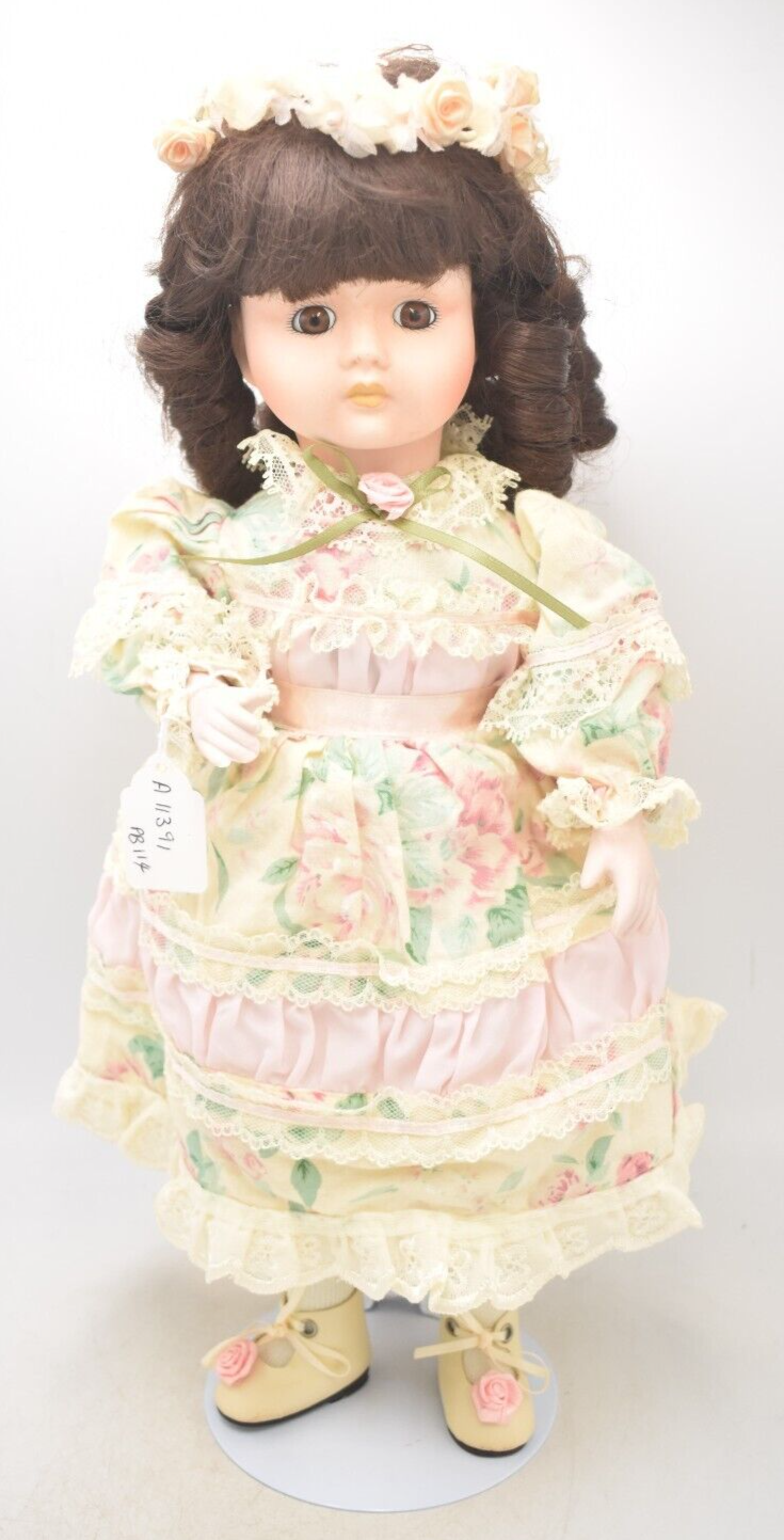 Vintage Porcelain Doll Brown Hair, Brown Eyes and Floral Dress