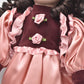 Vintage Porcelain Doll Brown Hair, Brown Eyes and Pink Silk Dress