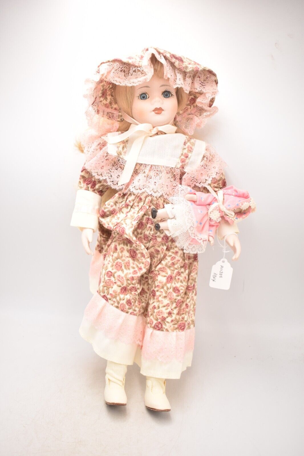 Vintage Porcelain Doll and Baby Doll Blonde Hair, Blue Eyes and Pink Dress