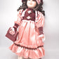 Vintage Porcelain Doll Brown Hair, Brown Eyes and Pink Silk Dress