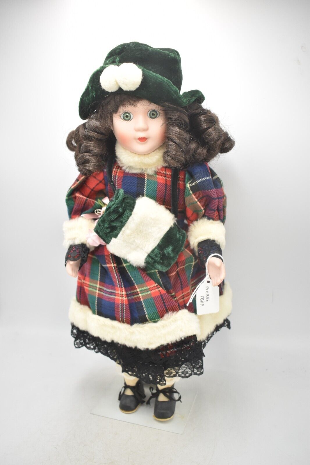 Vintage Porcelain Doll Brown Hair, Green Eyes and Tartan Dress