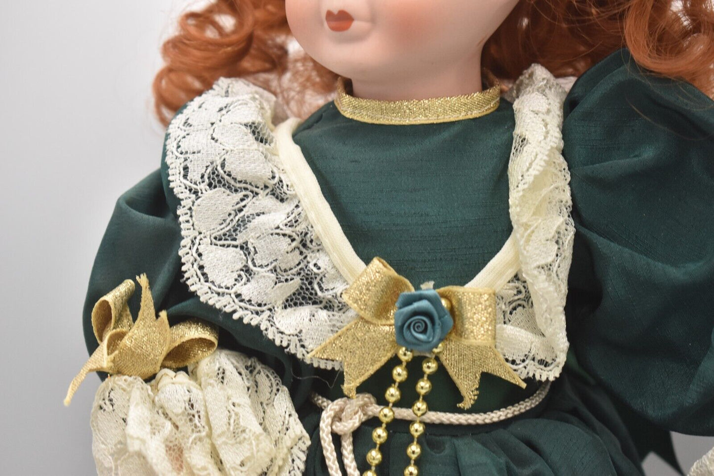 Vintage Porcelain Doll Ginger Hair, Green Eyes and Green Christmas Dress