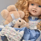 Vintage Porcelain Doll With Teddy Bear Blonde Hair, Blue Eyes and Blue Silk Dres