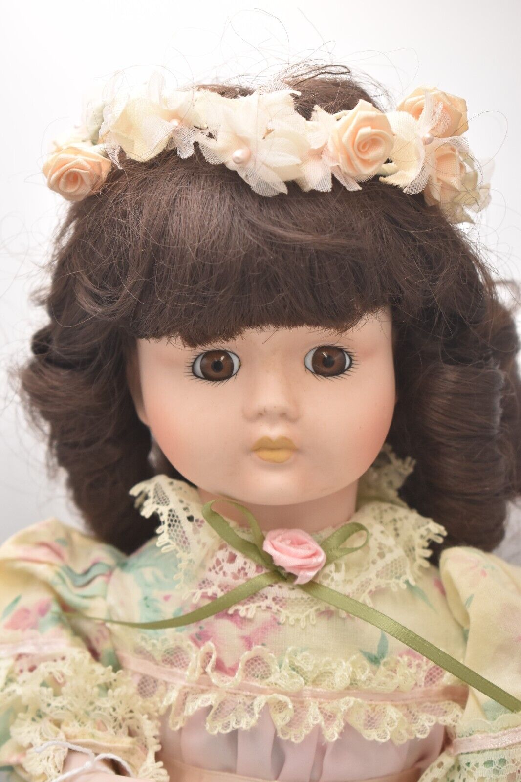 Vintage Porcelain Doll Brown Hair, Brown Eyes and Floral Dress