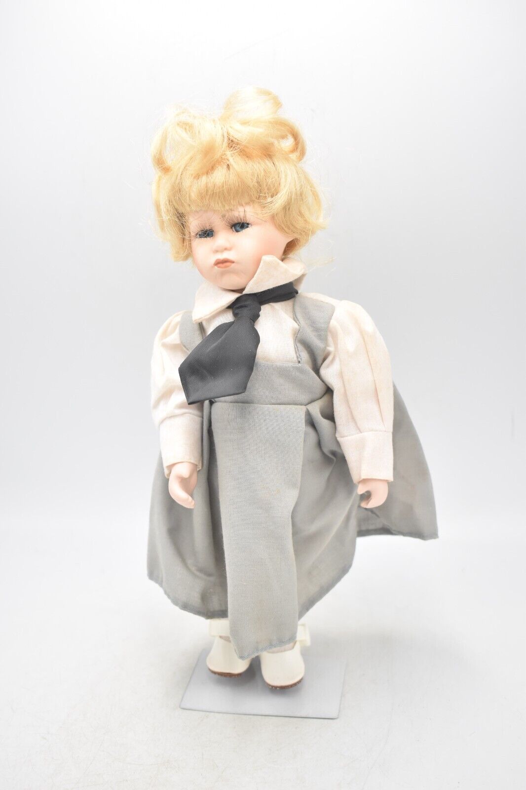 Vintage Porcelain Doll – Blonde Hair, Blue Eyes & Pinafore Dress